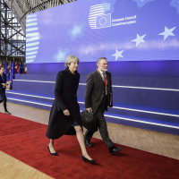 Theresa May weakened but welcome in Brussels