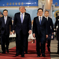 Donald Trump lands in China for high-stakes talks