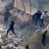 Israeli settlers trap Palestinians in their West Bank homes