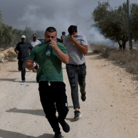 Israeli settlers attack Palestinians during olive harvest