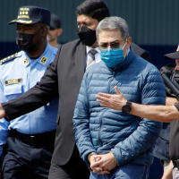 Trump is targeting alleged drug boats. Why is he now pardoning a drug trafficker?