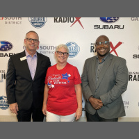 Beth and Herb Hoffman with the Duluth Fall Festival and Marvin Jinks with Wilmington Insurance Advisors